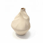 White Sculptural Vase on Pedestal